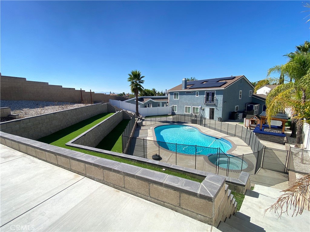 971 Saltcoats Drive Riverside, CA 92508 - Photo 40 of 50 a view of a patio with swimming pool table and chairs