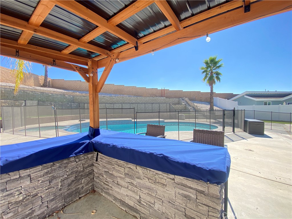 971 Saltcoats Drive Riverside, CA 92508 - Photo 47 of 50 a view of a backyard with a sitting space