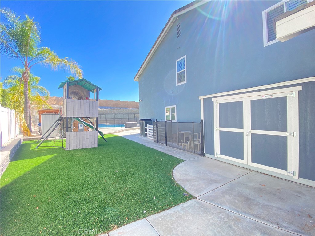971 Saltcoats Drive Riverside, CA 92508 - Photo 49 of 50 a view of a house with a yard