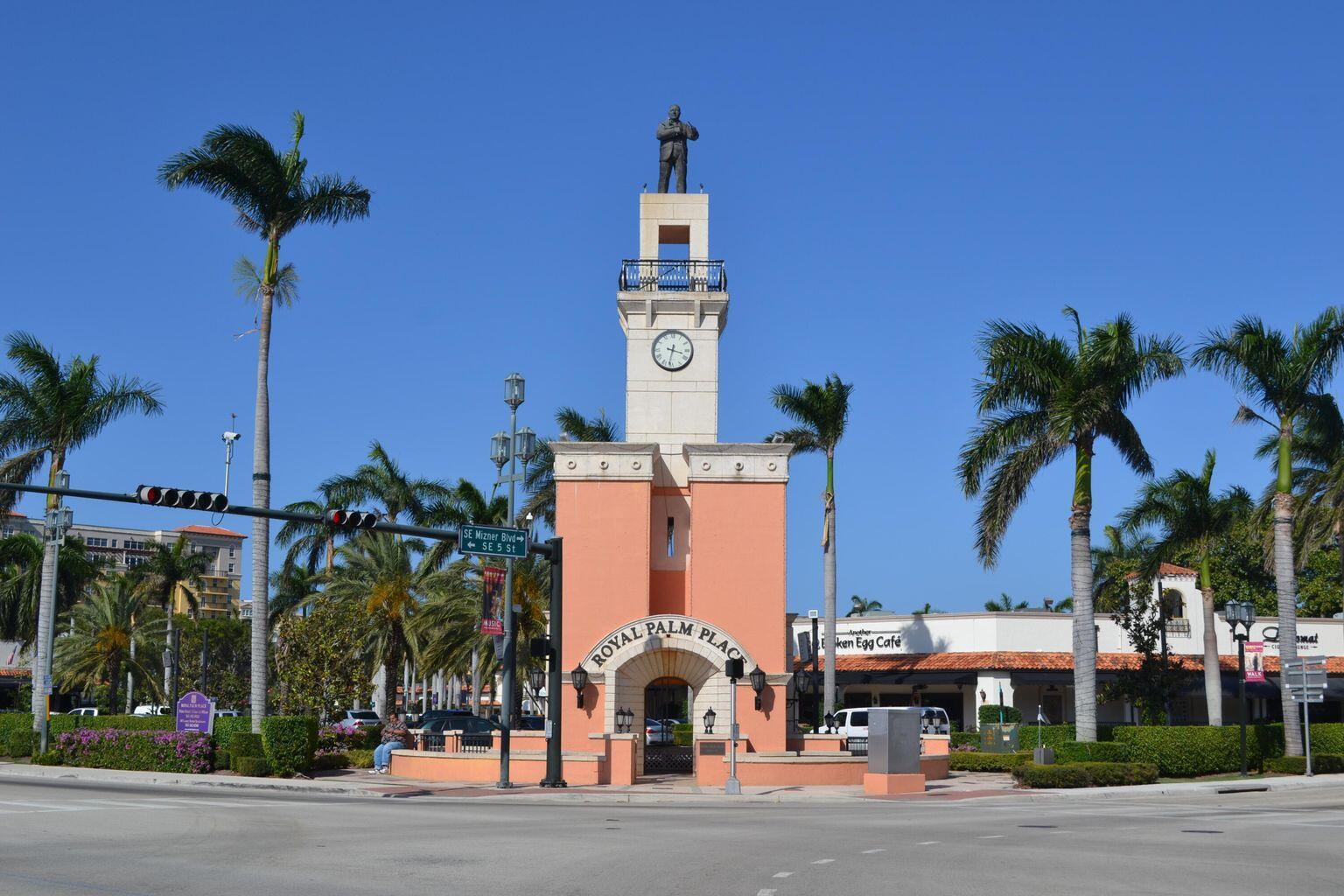 245 Southwest 6th Street Boca Raton, FL 33432 - Photo 39 of 40 a front view of a building with palm trees