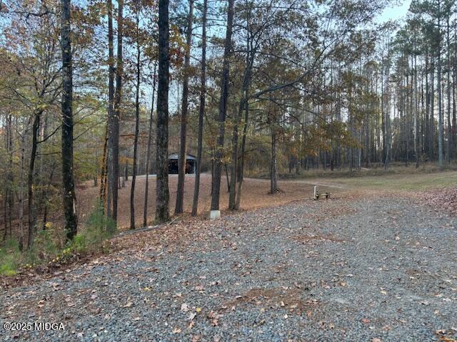 1774 Maynards Mill Road Forsyth, GA 31029 - Photo 17 of 76 a view of outdoor space with deck and tree