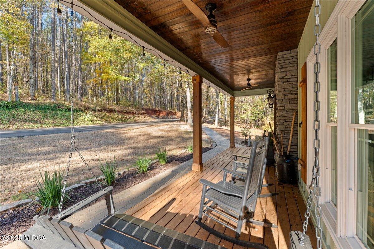 1774 Maynards Mill Road Forsyth, GA 31029 - Photo 25 of 76 a view of a balcony with wooden floor