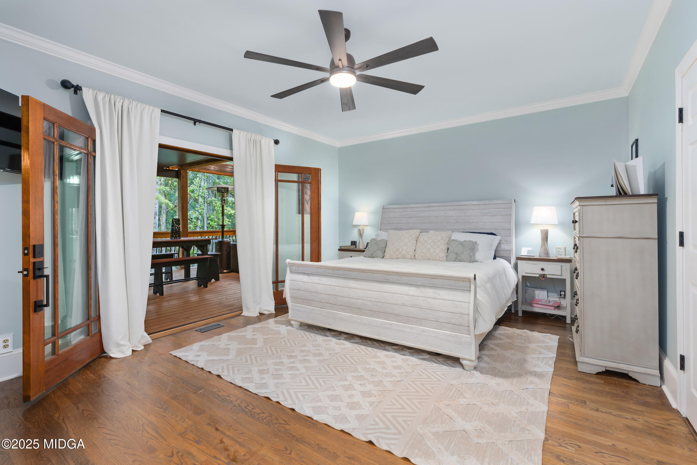 1774 Maynards Mill Road Forsyth, GA 31029 - Photo 45 of 76 a spacious bedroom with a bed and a large window