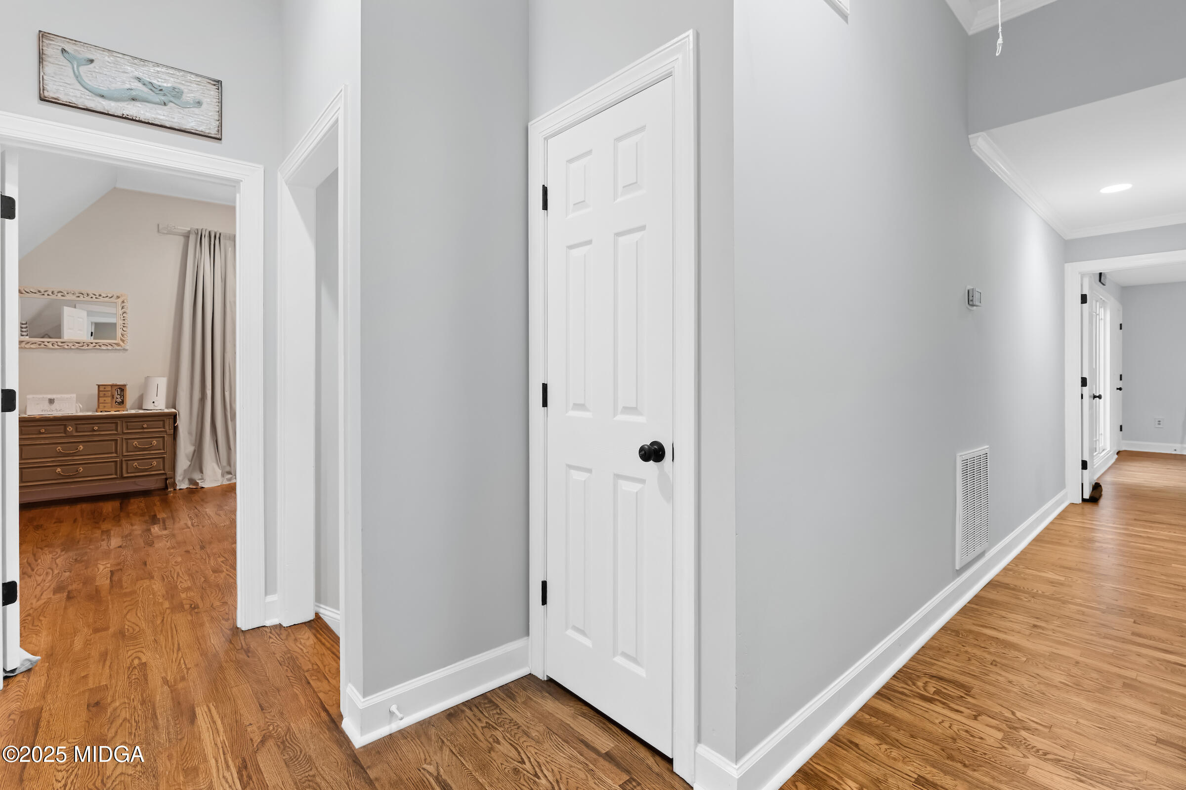 1774 Maynards Mill Road Forsyth, GA 31029 - Photo 53 of 76 a view of a hallway with wooden floor and closet
