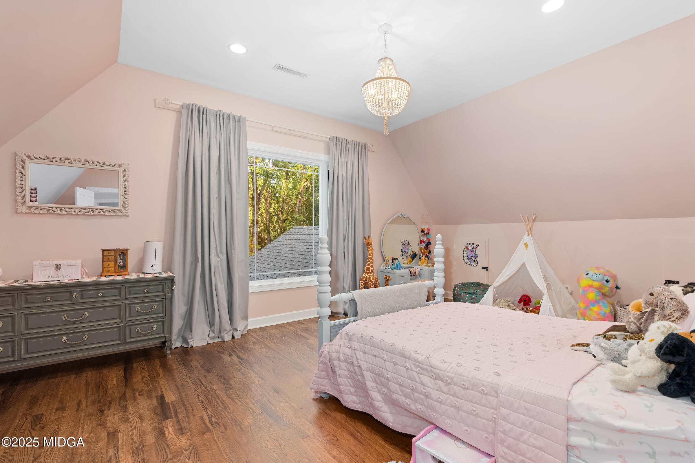 1774 Maynards Mill Road Forsyth, GA 31029 - Photo 55 of 76 a bed room with a bed and a window