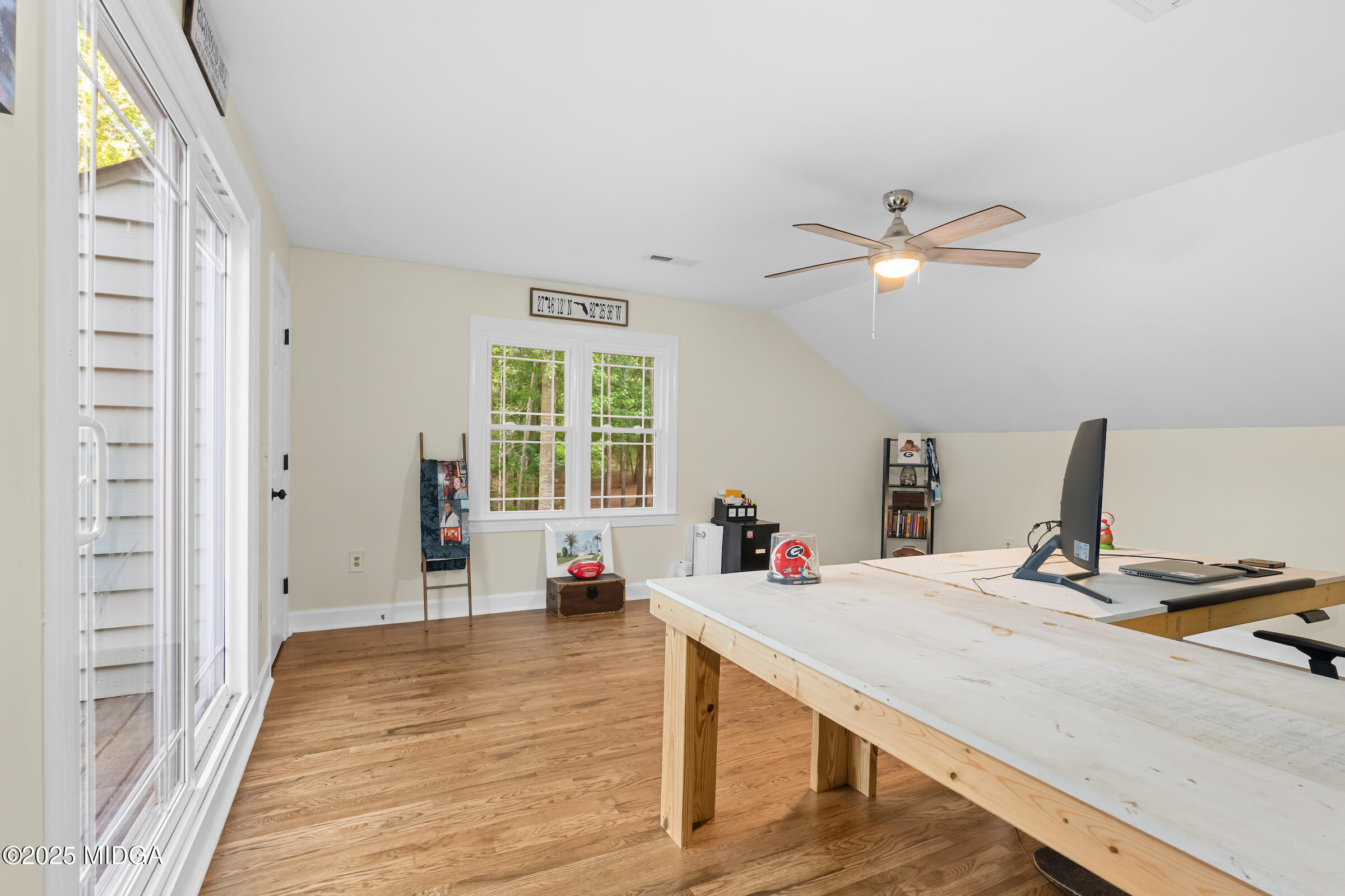1774 Maynards Mill Road Forsyth, GA 31029 - Photo 60 of 76 a view of a workspace with furniture and a window