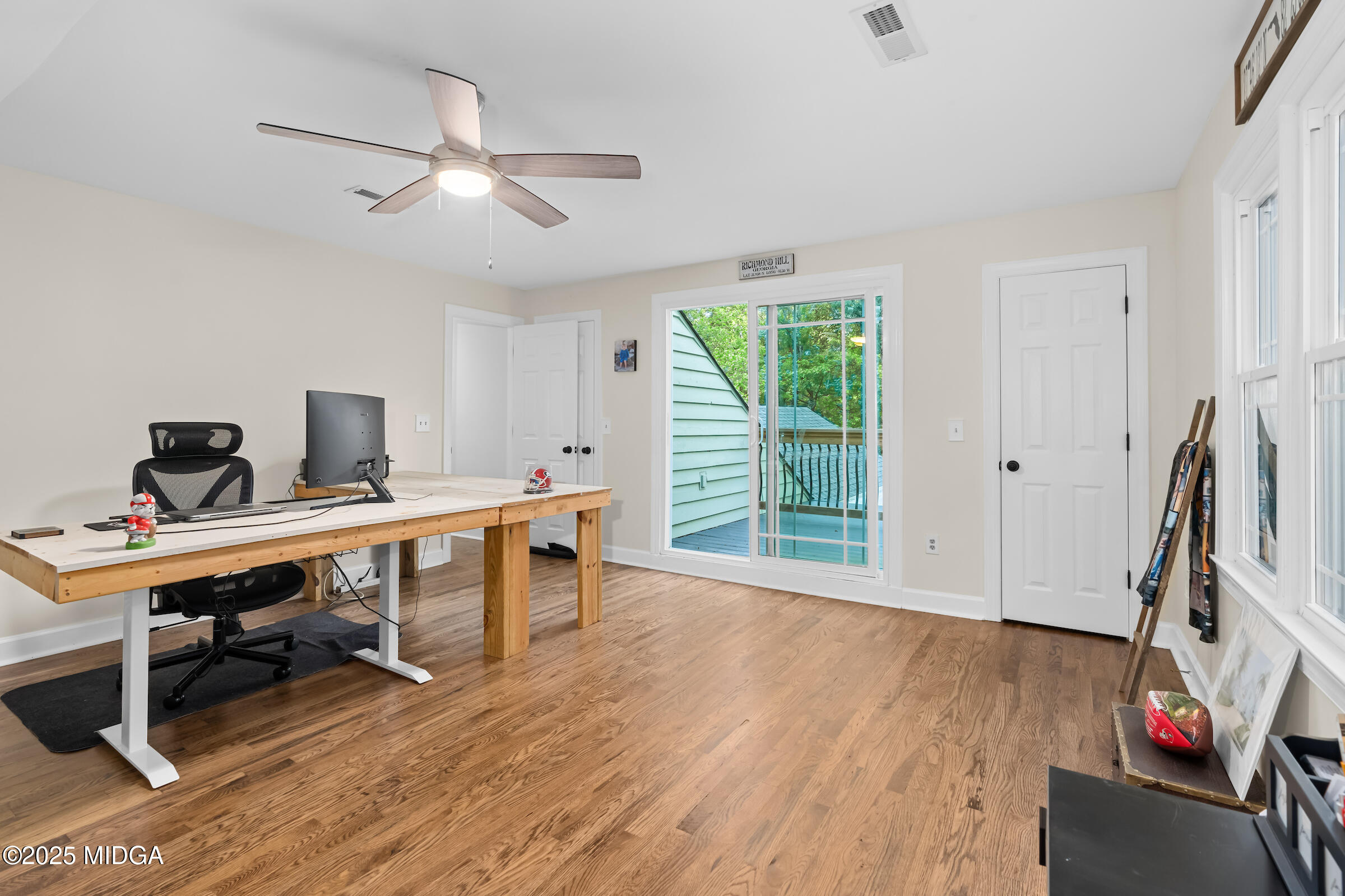 1774 Maynards Mill Road Forsyth, GA 31029 - Photo 61 of 76 a view of a workspace with furniture and a window
