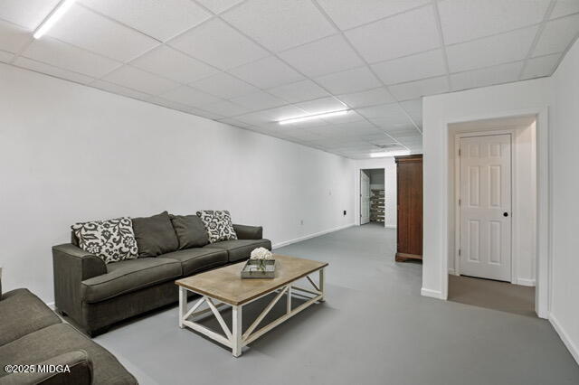 1774 Maynards Mill Road Forsyth, GA 31029 - Photo 64 of 76 a living room with furniture and a couch