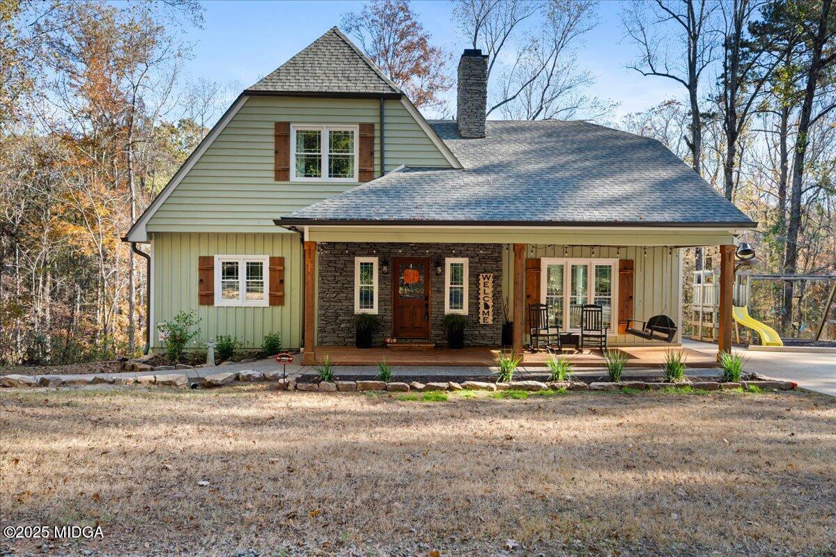 1774 Maynards Mill Road Forsyth, GA 31029 - Photo 75 of 76 a front view of a house with sitting area