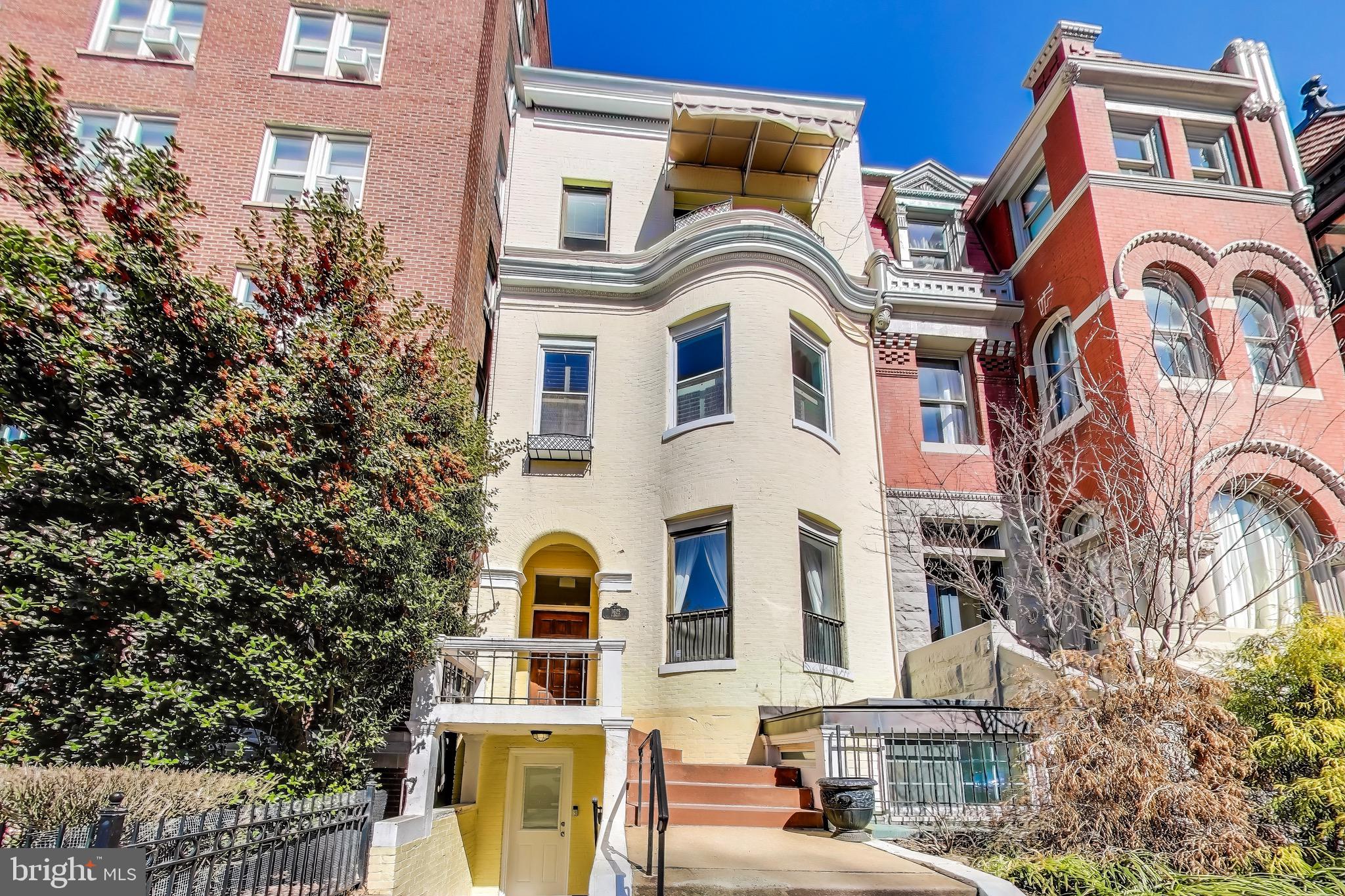 1625 S Street Northwest, Unit 1 Washington, DC 20009 - Photo 1 of 13 a front view of a multi story residential apartment building