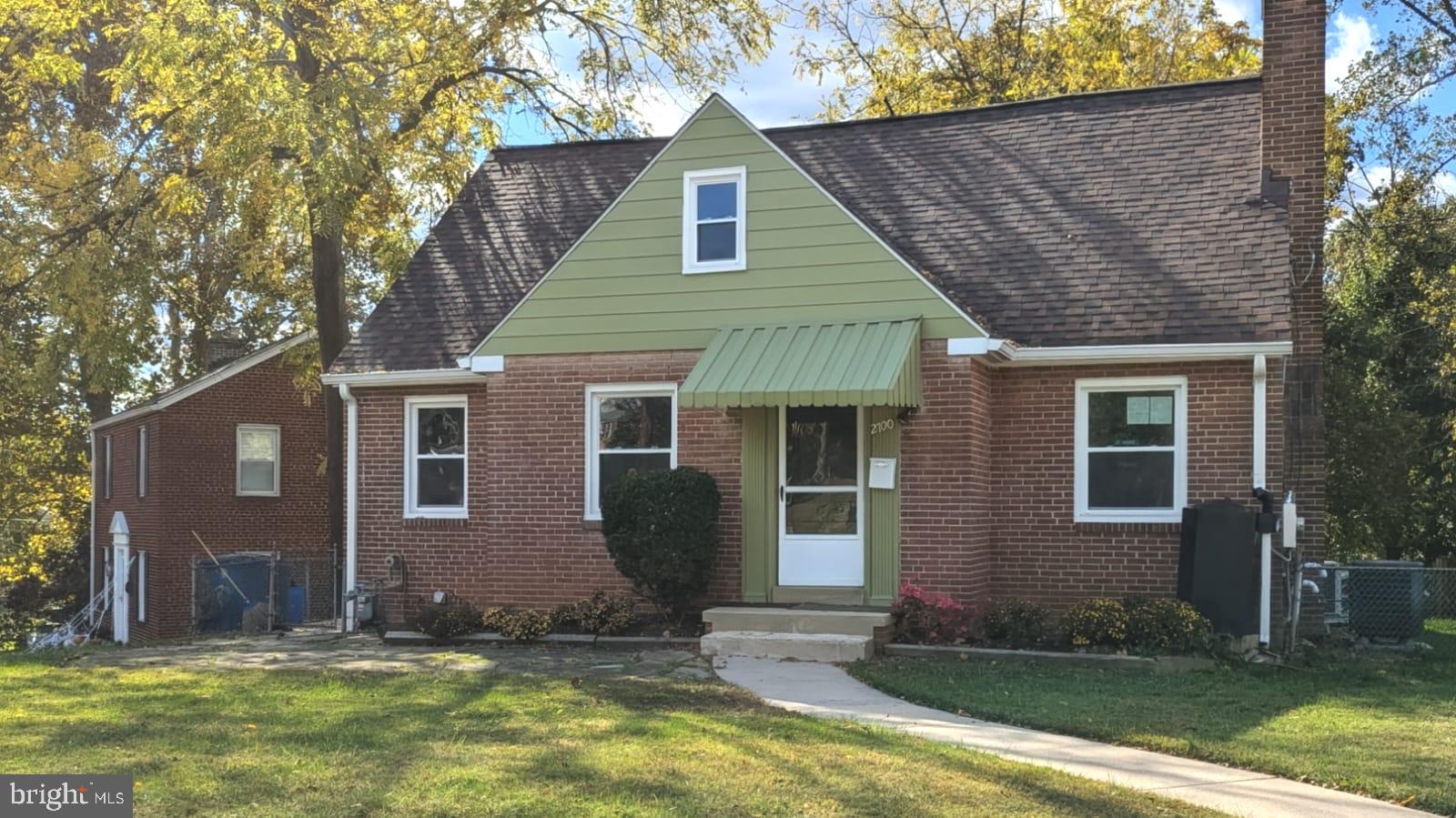 2700 Dawson Avenue Silver Spring, MD 20902 - Photo 1 of 11 a front view of a house with a yard