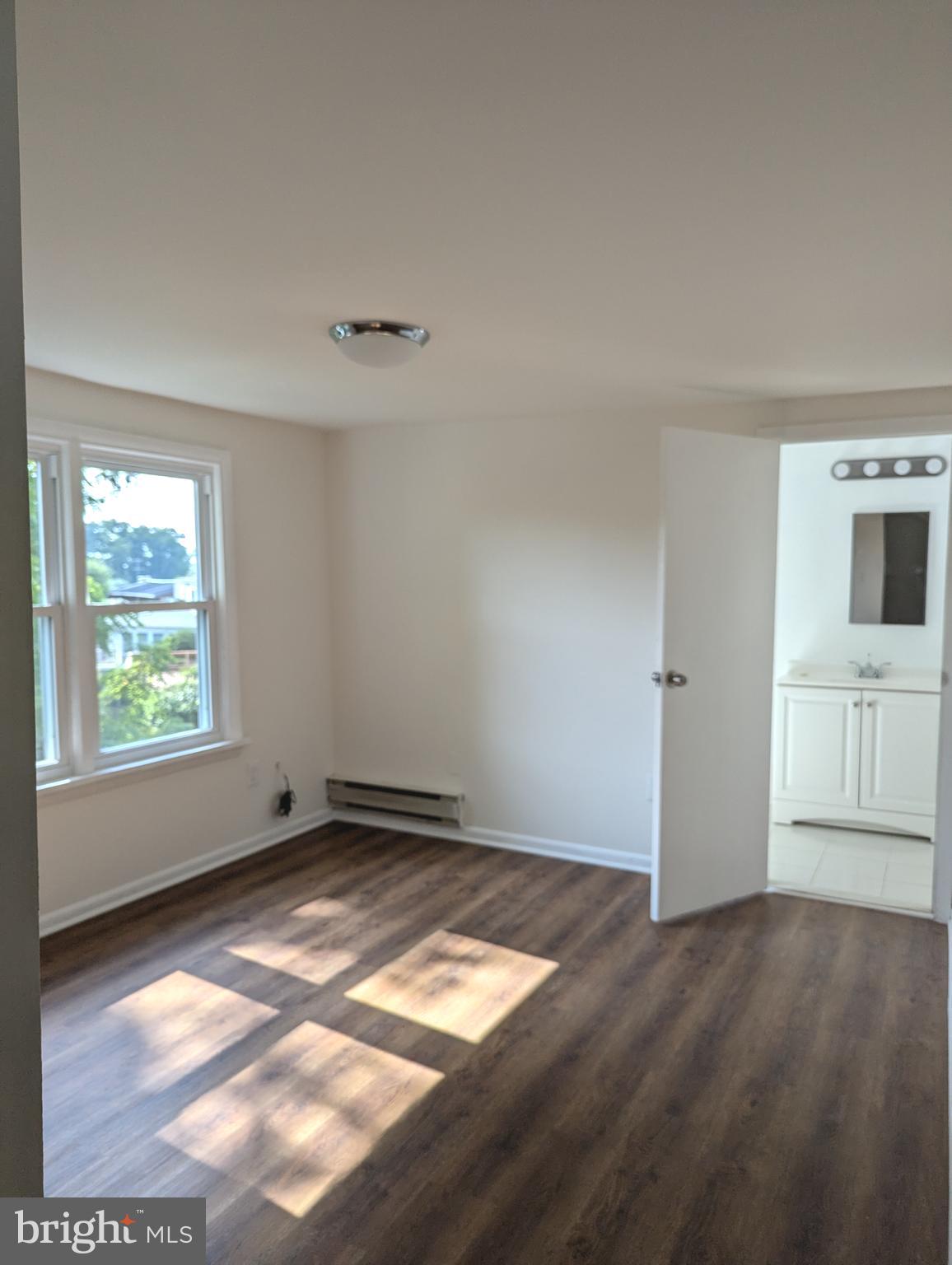 2700 Dawson Avenue Silver Spring, MD 20902 - Photo 8 of 11 an empty room with windows
