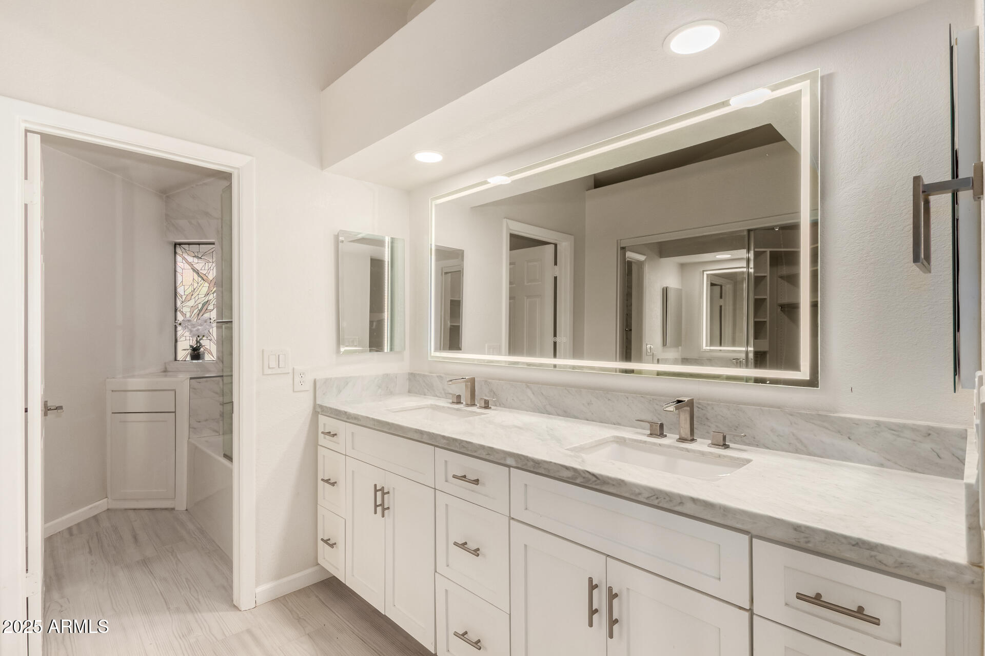 11860 North 40th Way Phoenix, AZ 85028 - Photo 16 of 31 a bathroom with a granite countertop sink double and mirror