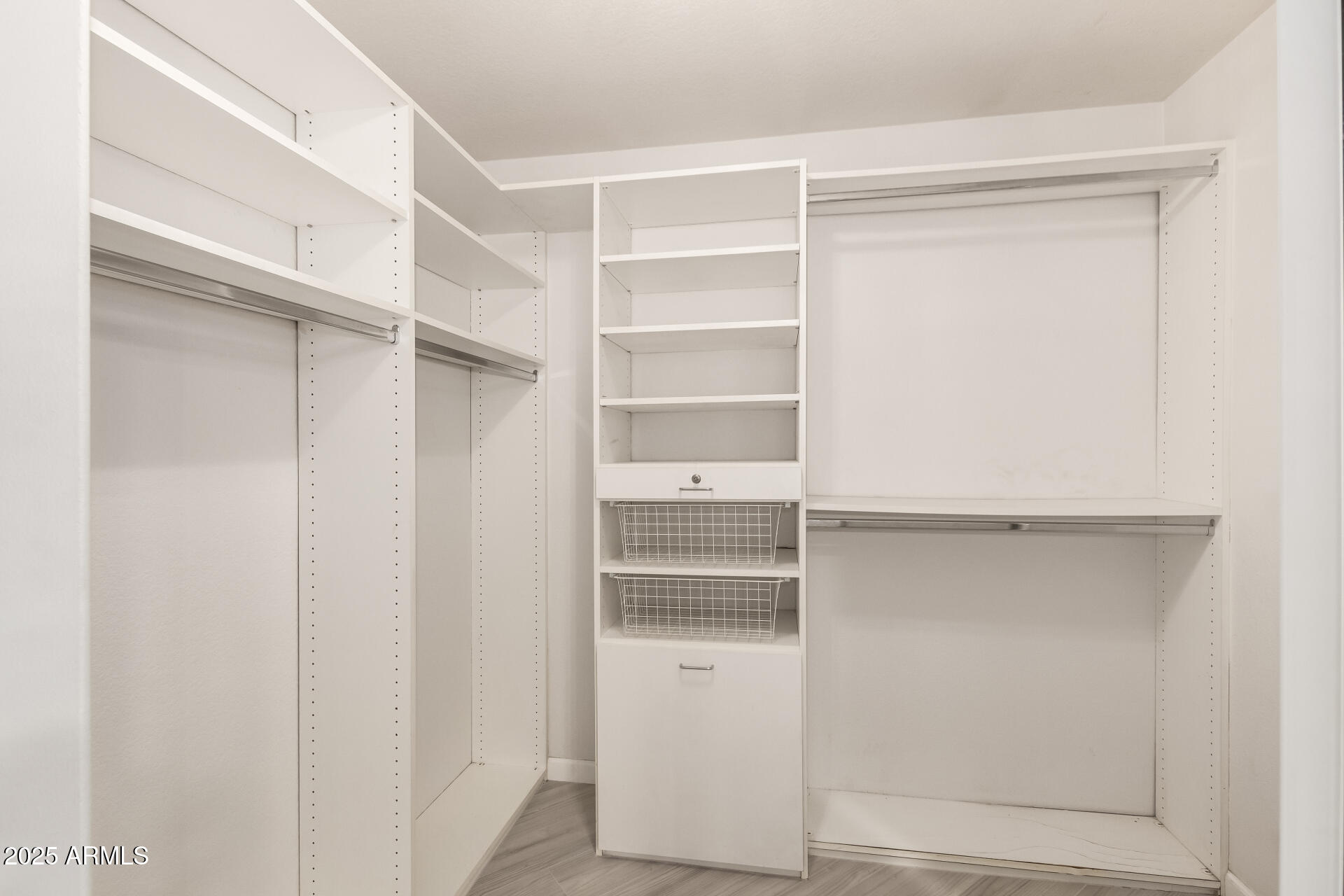 11860 North 40th Way Phoenix, AZ 85028 - Photo 18 of 31 a view of walk in closet with empty racks