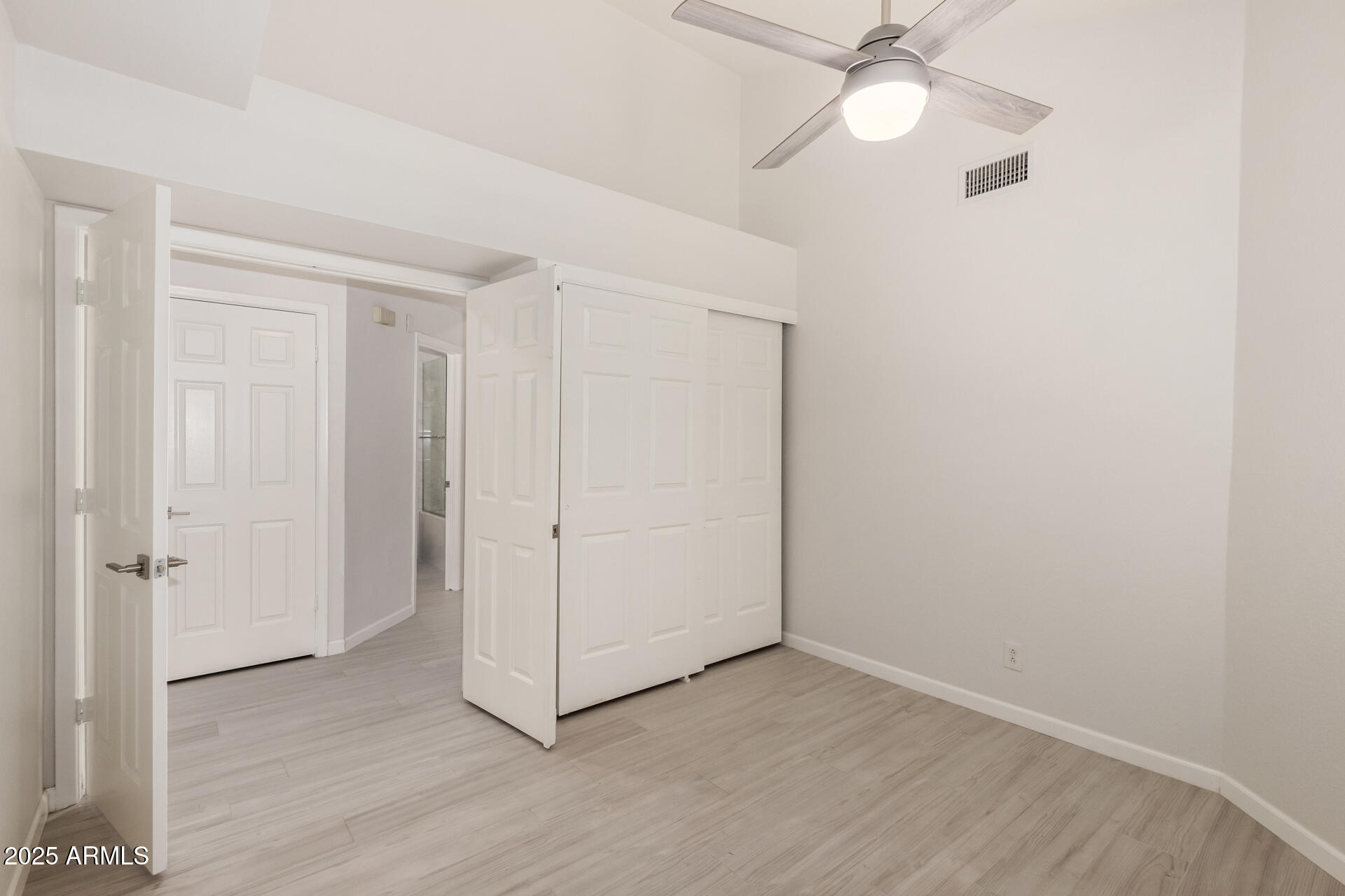11860 North 40th Way Phoenix, AZ 85028 - Photo 20 of 31 wooden floor in an empty room