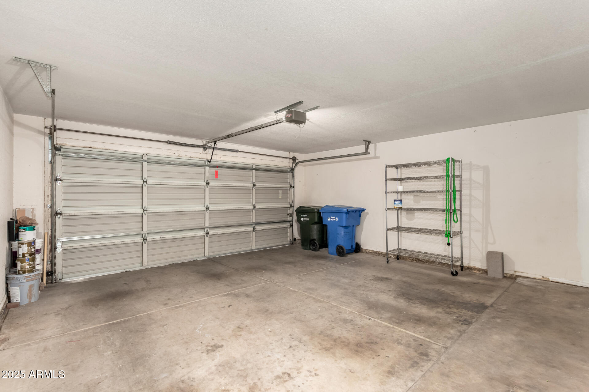 11860 North 40th Way Phoenix, AZ 85028 - Photo 26 of 31 a view of room and racks on the wall