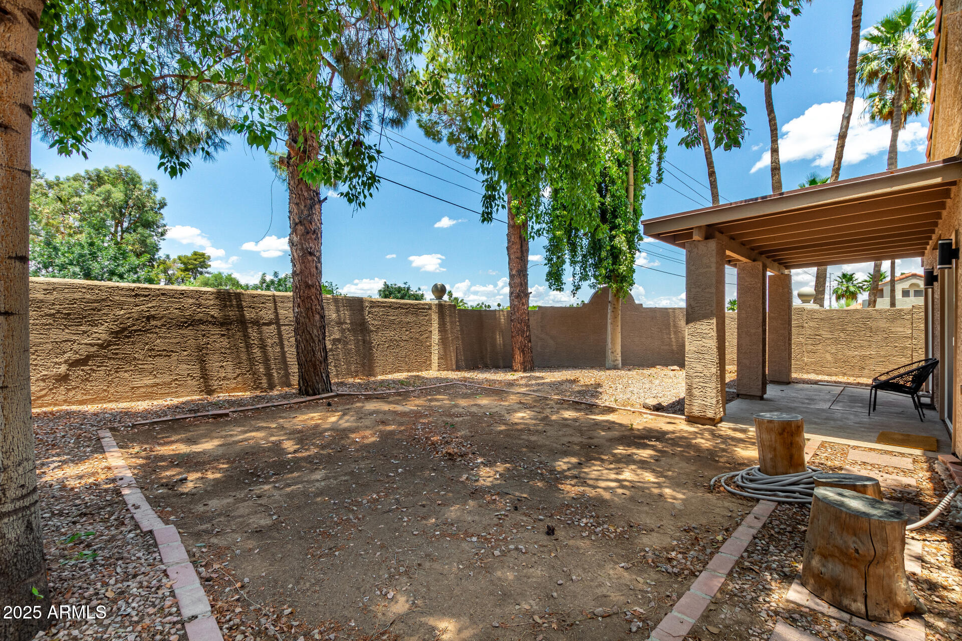 11860 North 40th Way Phoenix, AZ 85028 - Photo 28 of 31 a view of a backyard with large tree