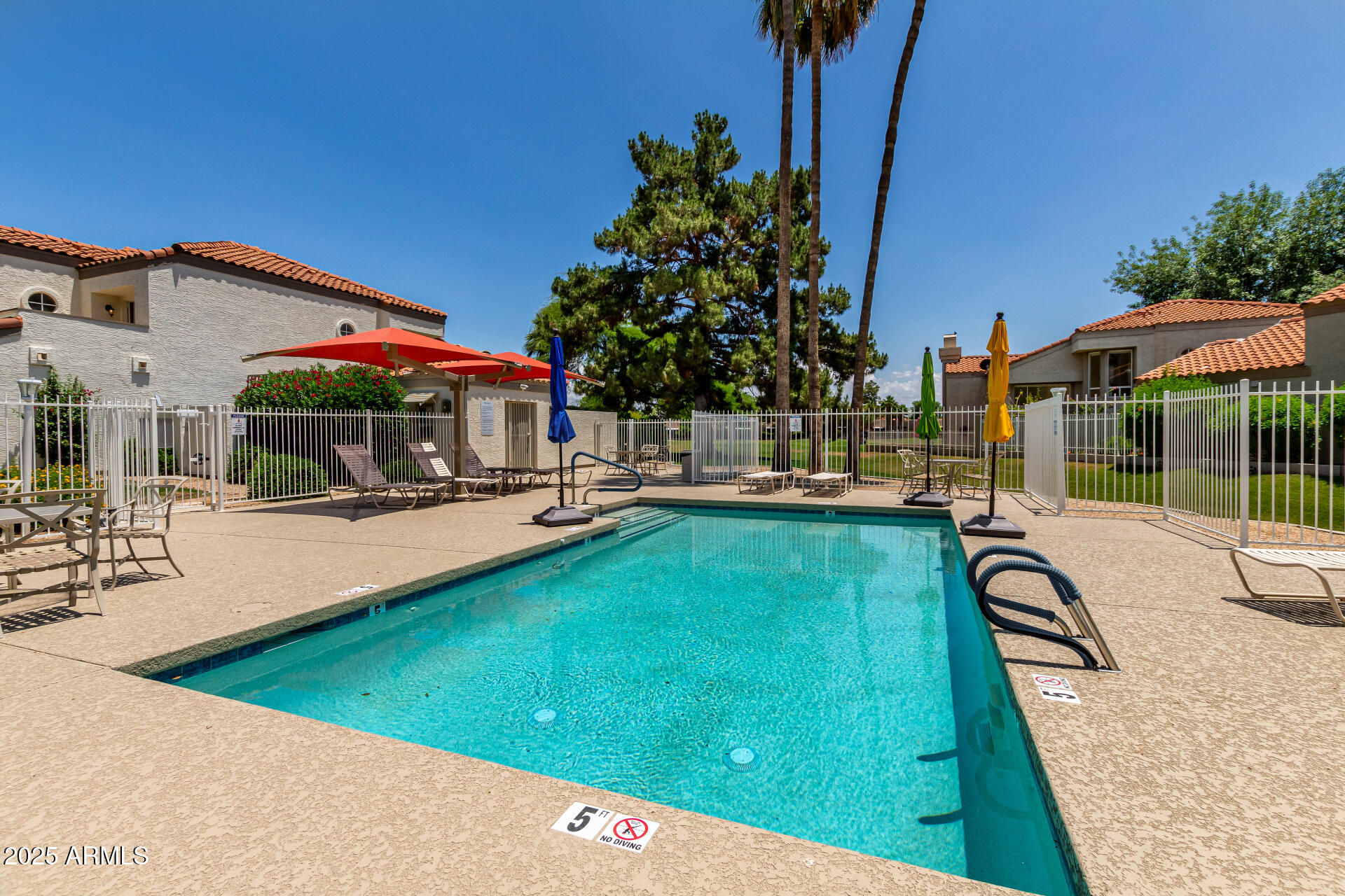 11860 North 40th Way Phoenix, AZ 85028 - Photo 30 of 31 a swimming pool with outdoor seating and yard