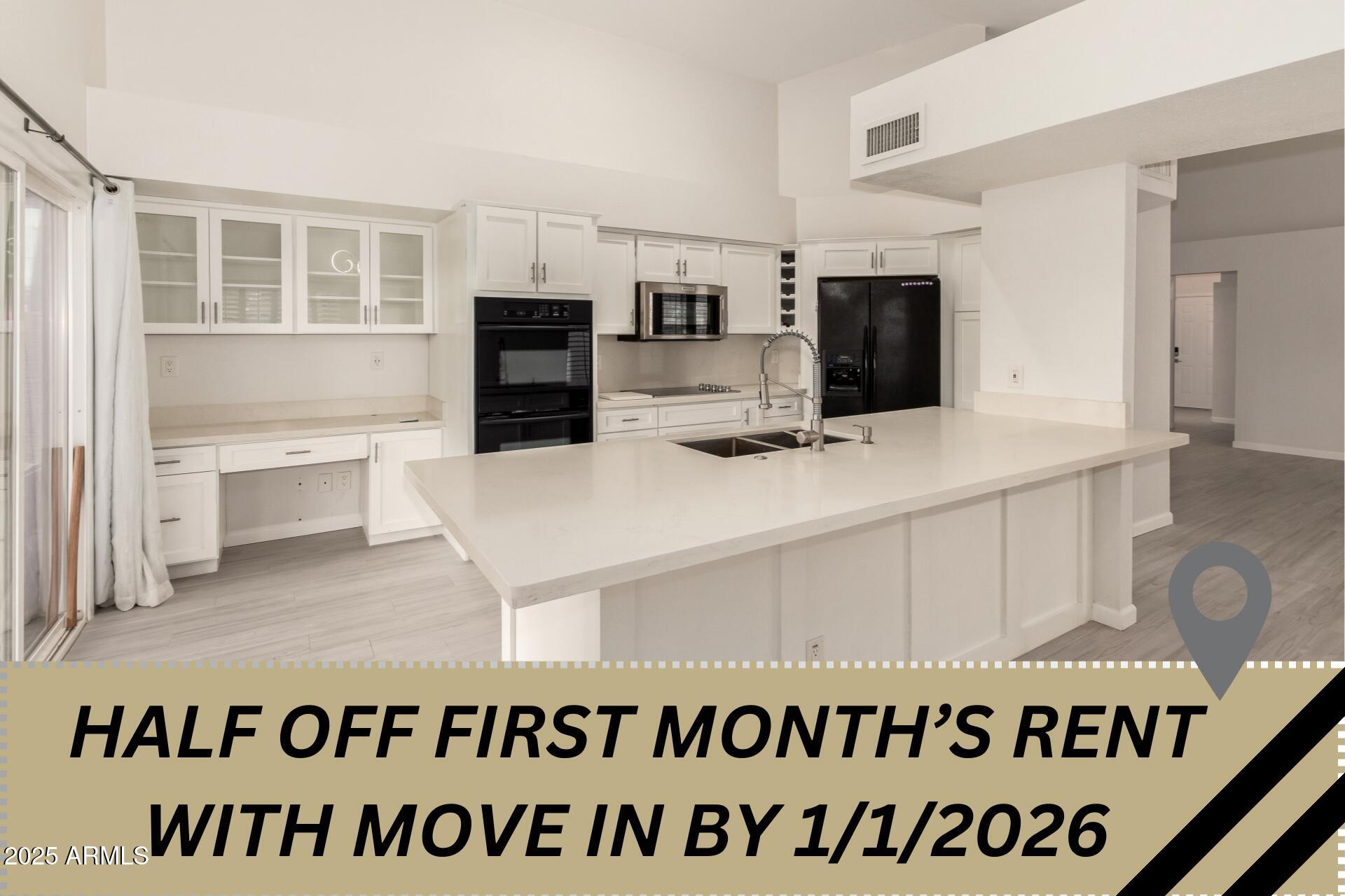 11860 North 40th Way Phoenix, AZ 85028 - Photo 31 of 31 a kitchen with kitchen island a counter top space stainless steel appliances and cabinets