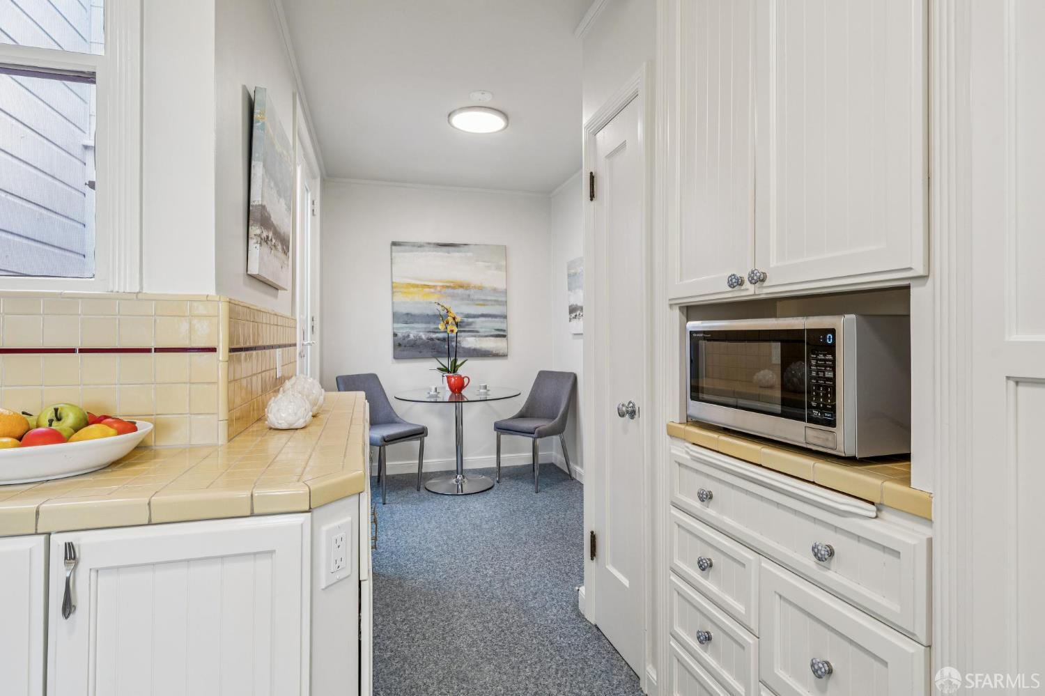 473 Melrose Avenue San Francisco, CA 94127 - Photo 21 of 94 a kitchen with stainless steel appliances a stove and cabinets