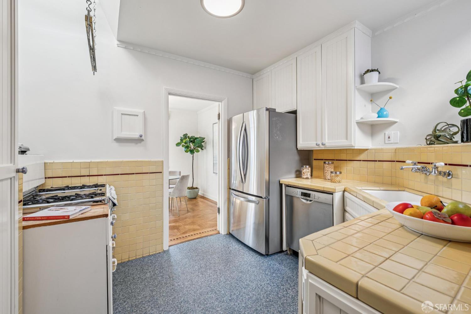 473 Melrose Avenue San Francisco, CA 94127 - Photo 25 of 94 a kitchen with a stove refrigerator and a sink