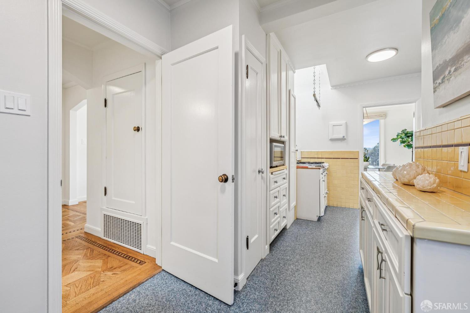 473 Melrose Avenue San Francisco, CA 94127 - Photo 35 of 94 a view of a kitchen with white cabinets