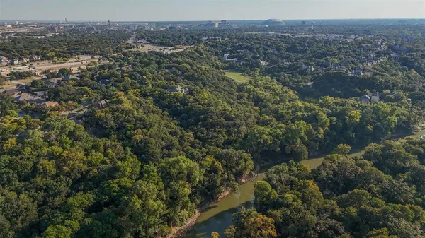 an aerial view of residential house and green space
