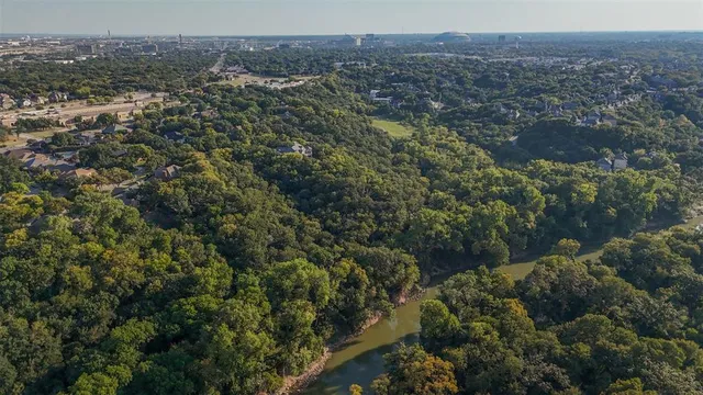 an aerial view of residential house and green space