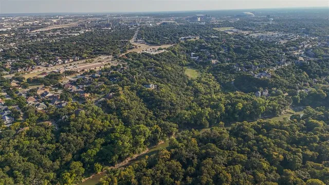 an aerial view of residential house and green space