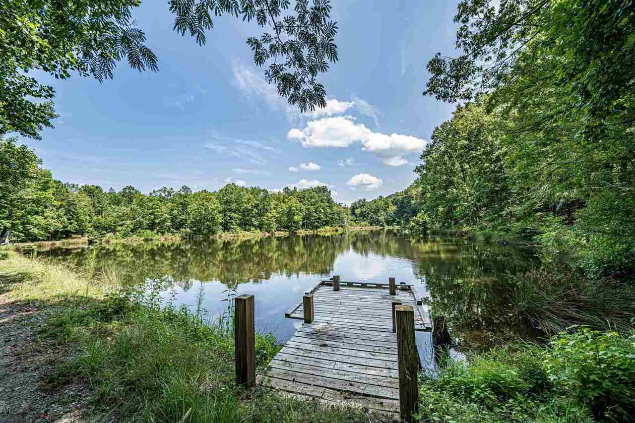 722 Ethridge Road Haddock, GA 31033 - Photo 1 of 1 a view of a lake with a yard