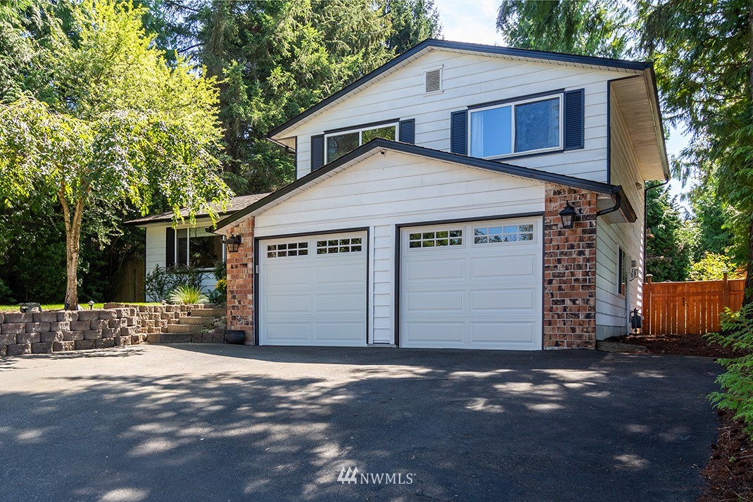 10025 Northeast 204th Street Bothell, WA 98011 - Photo 1 of 40 a house with a outdoor space