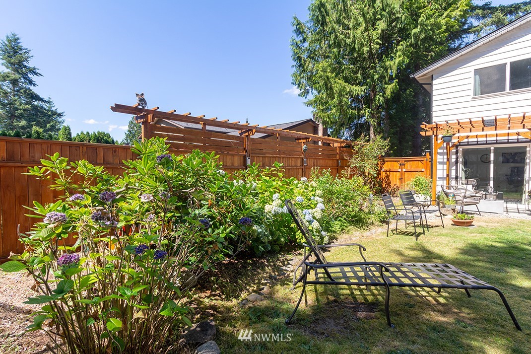 10025 Northeast 204th Street Bothell, WA 98011 - Photo 38 of 40 a view of a swimming pool with a patio
