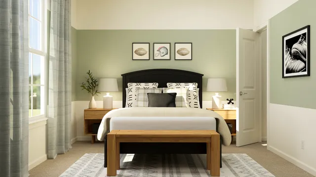 a bedroom with a bed table and a window