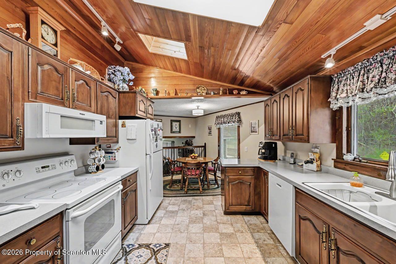 73 Quinton Road Scott Township, PA 18447 - Photo 18 of 64 a kitchen that has a lot of cabinets in it