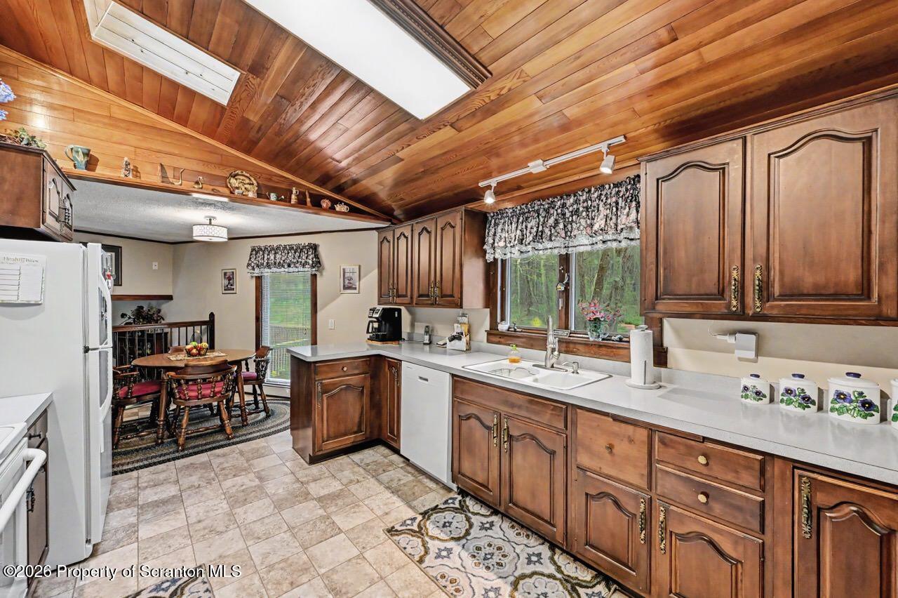 73 Quinton Road Scott Township, PA 18447 - Photo 19 of 64 a large kitchen with lots of counter space and a sink