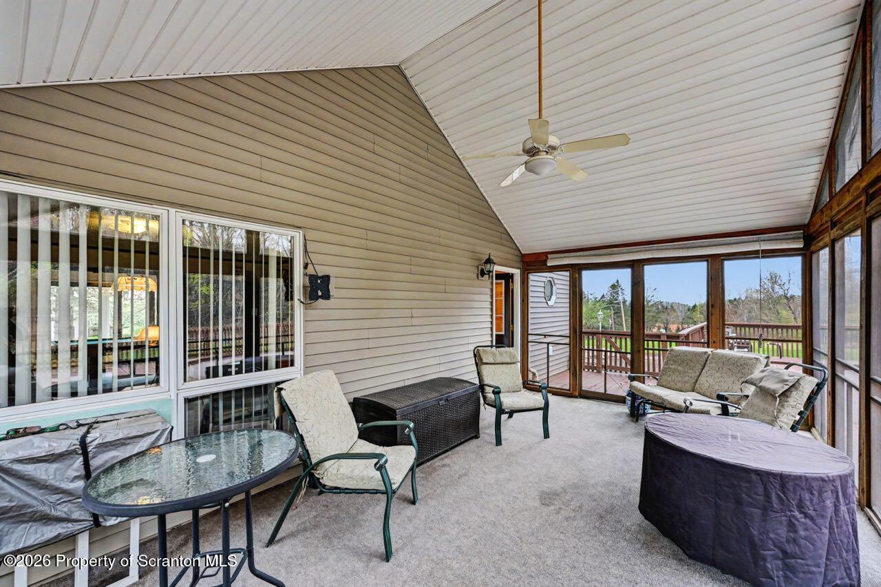 73 Quinton Road Scott Township, PA 18447 - Photo 35 of 64 a balcony with furniture and large windows