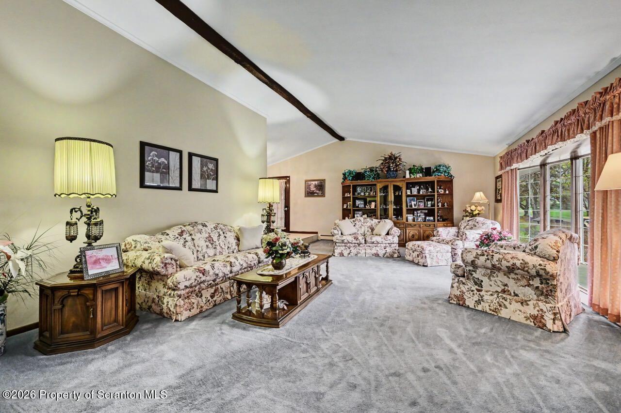 73 Quinton Road Scott Township, PA 18447 - Photo 5 of 64 a bedroom with furniture and a ceiling fan