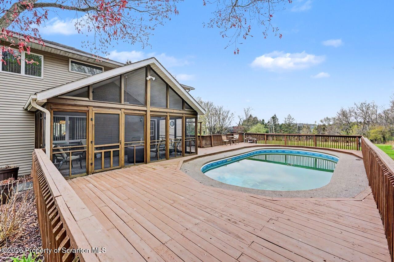 73 Quinton Road Scott Township, PA 18447 - Photo 55 of 64 a view of balcony with wooden floor and fence