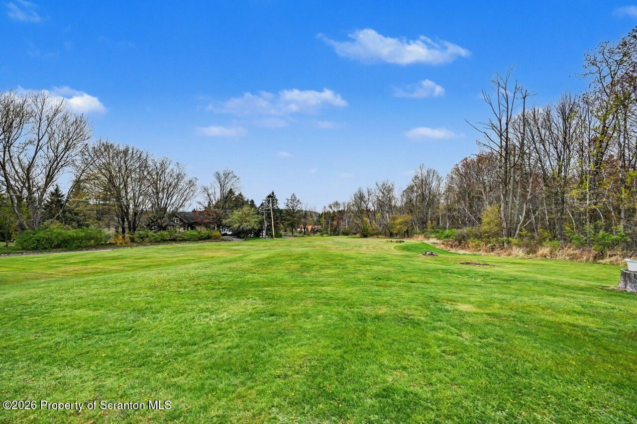 73 Quinton Road Scott Township, PA 18447 - Photo 59 of 64 a view of grassy field with trees