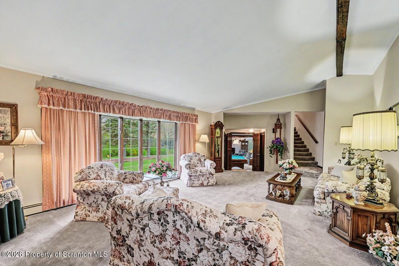 73 Quinton Road Scott Township, PA 18447 - Photo 6 of 64 a view of a livingroom with furniture and a large window