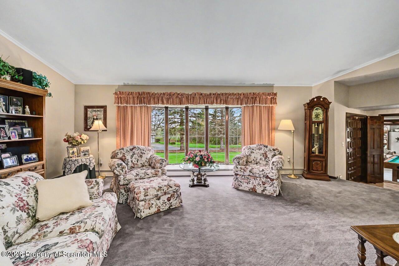 73 Quinton Road Scott Township, PA 18447 - Photo 7 of 64 a living room with furniture and large windows