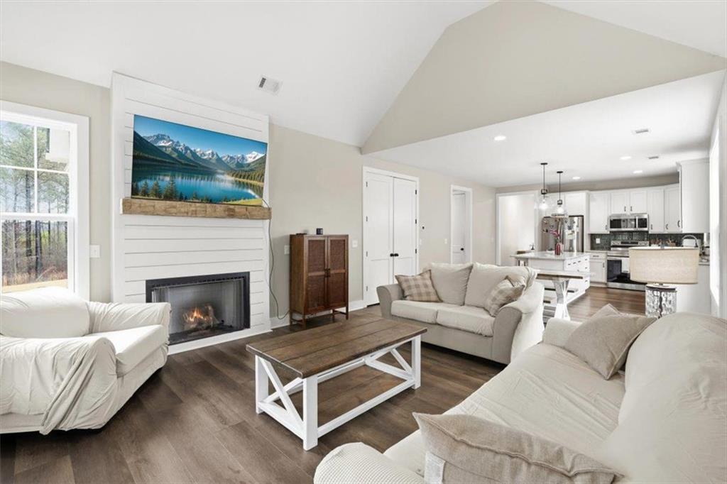 1270 McGarity Road Temple, GA 30179 - Photo 12 of 58 a living room with furniture and a fireplace