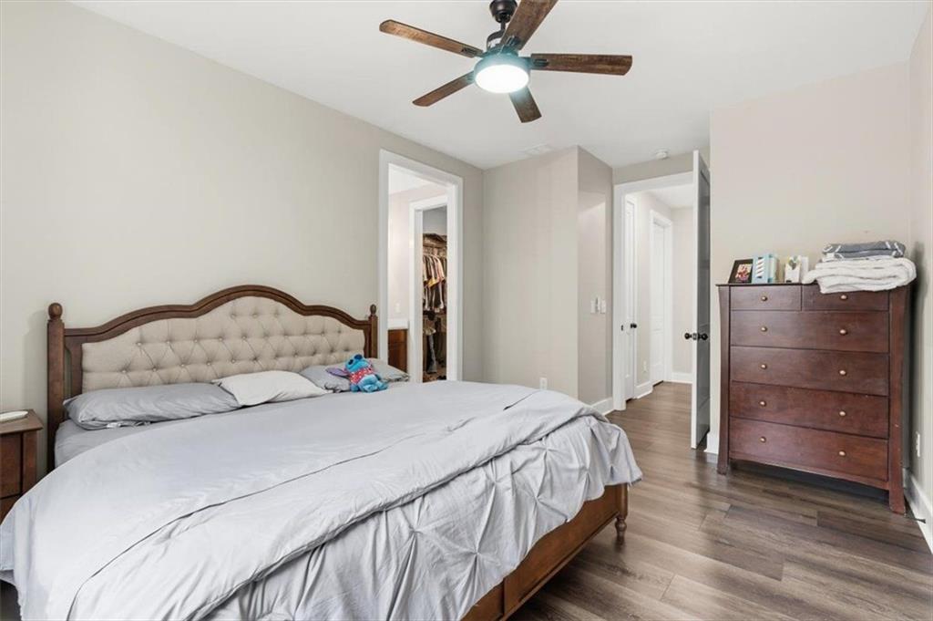 1270 McGarity Road Temple, GA 30179 - Photo 24 of 58 a bedroom with a bed and a dresser