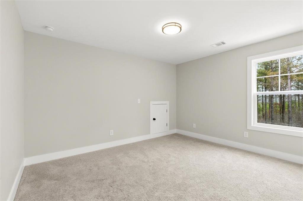 1270 McGarity Road Temple, GA 30179 - Photo 37 of 58 an empty room with a window
