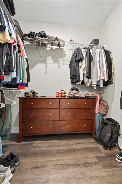 1270 McGarity Road Temple, GA 30179 - Photo 38 of 58 a view of walk in closet with clothes and shoes