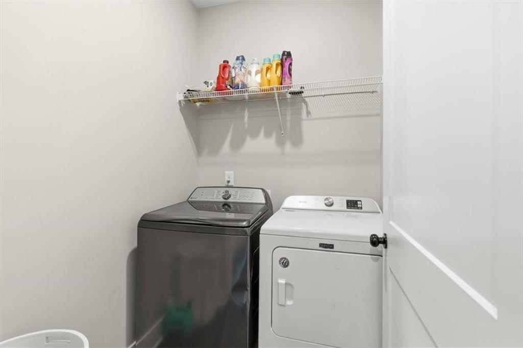 1270 McGarity Road Temple, GA 30179 - Photo 39 of 58 a utility room with dryer and washer