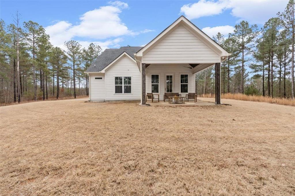 1270 McGarity Road Temple, GA 30179 - Photo 43 of 58 a view of a house with snow in the yard