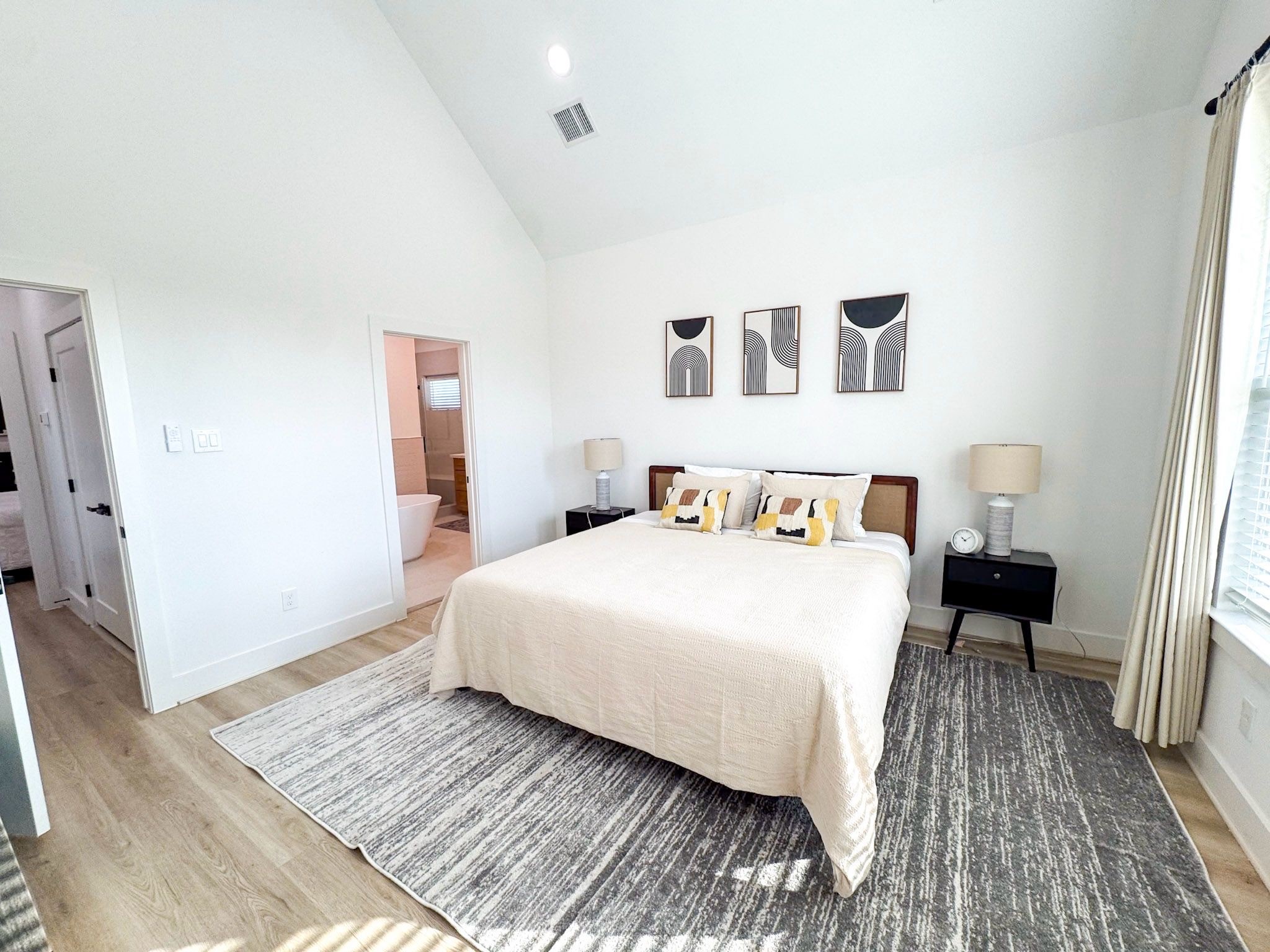 2706 Cochran Street Houston, TX 77009 - Photo 14 of 23 a bedroom with a bed and a table