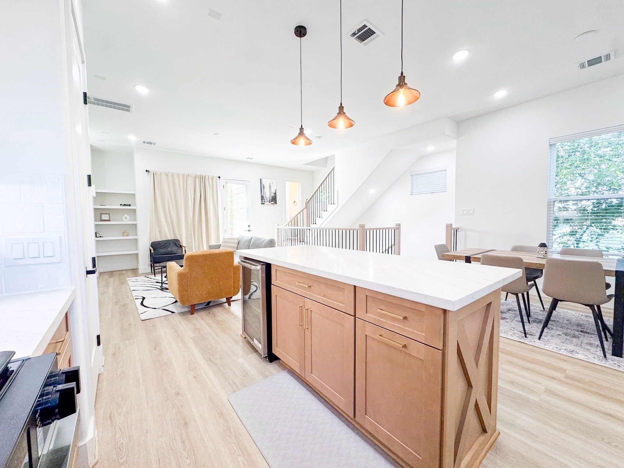 2706 Cochran Street Houston, TX 77009 - Photo 15 of 23 a large white kitchen with a large window