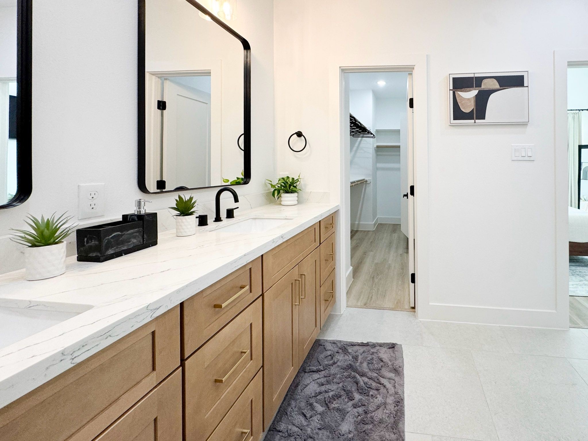 2706 Cochran Street Houston, TX 77009 - Photo 22 of 23 a bathroom with a double vanity sink and a mirror